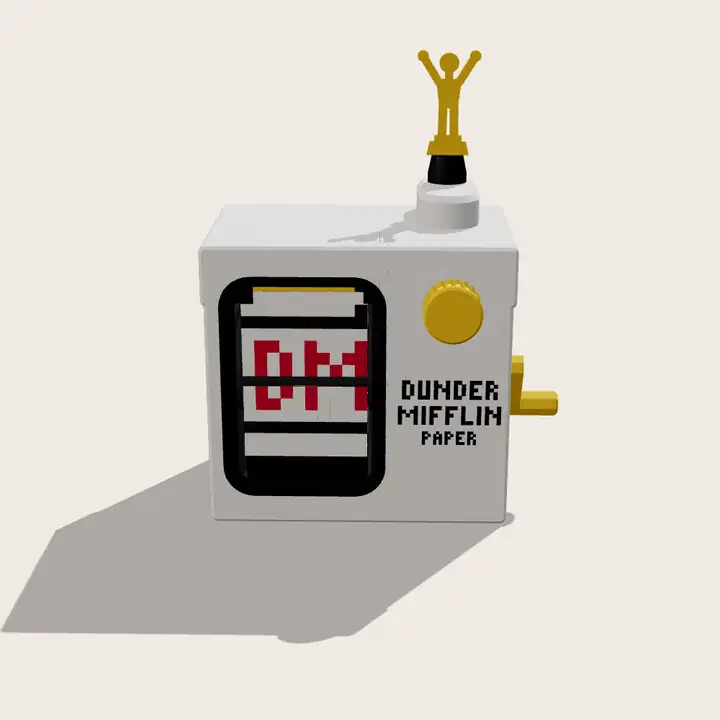 how it works: the crank clicks the flaps over, the knob turns the Dundie