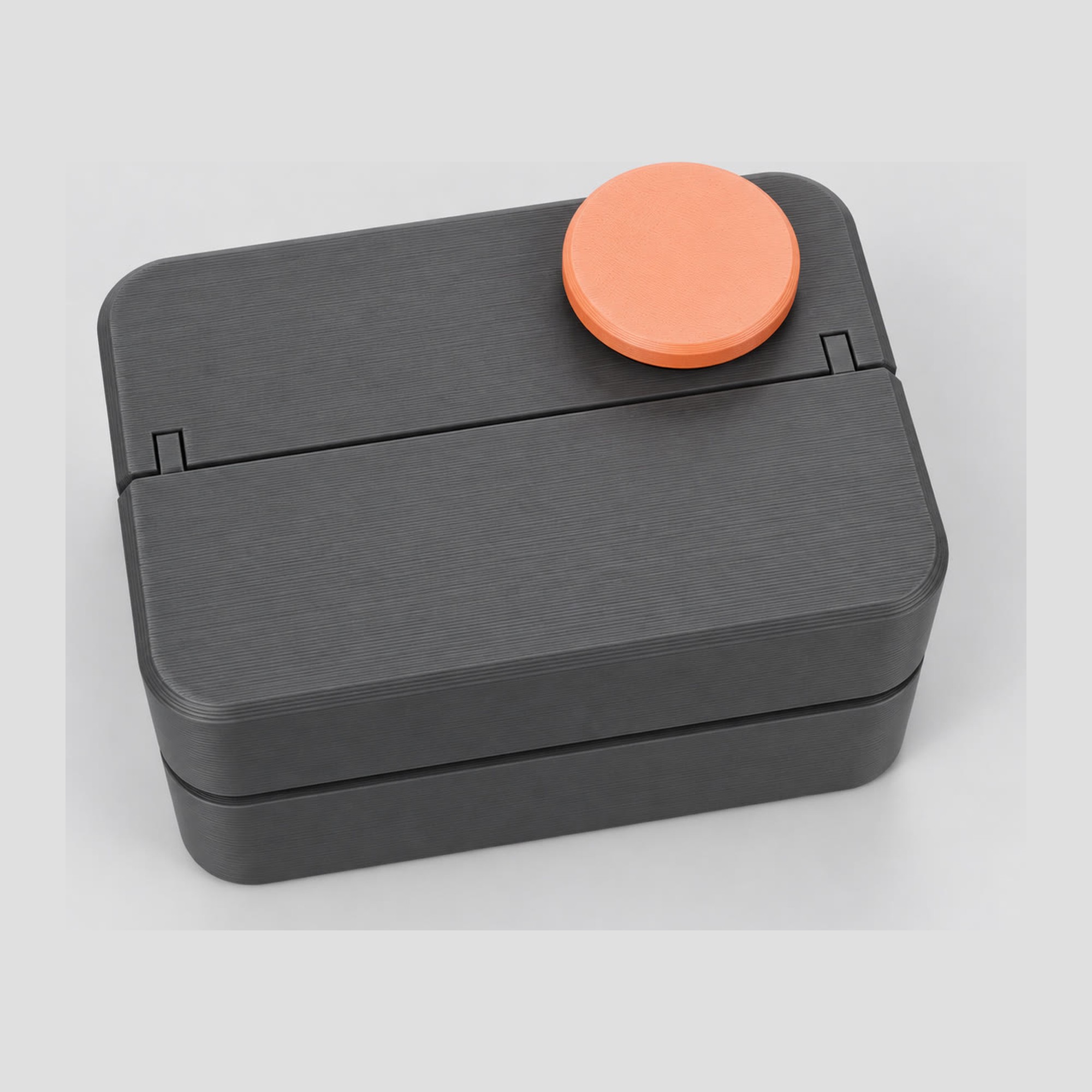 Render closed, black block with orange button